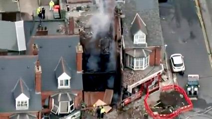 Aerial image of a terraced housing following an explosion in one of them