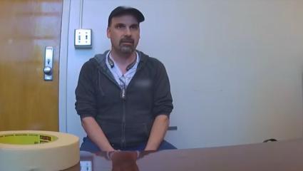 A teacher being interrogated by the 'Predator Hunters'