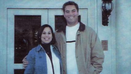 Scott and Laci Peterson smiling for a photo