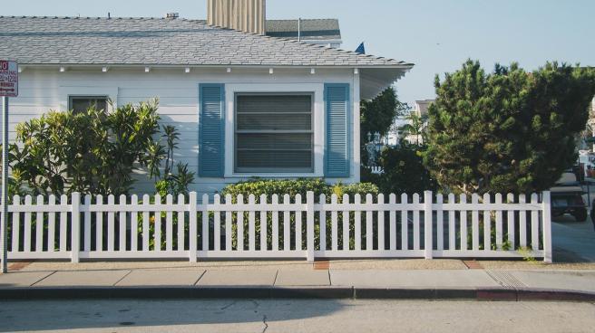 A traditional Californian house with picket fence