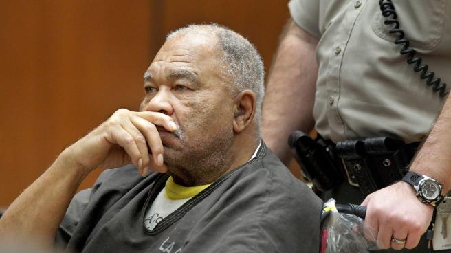 Samuel Little sitting in a wheelchair in court