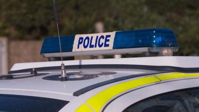 Blue lights on top of a police car