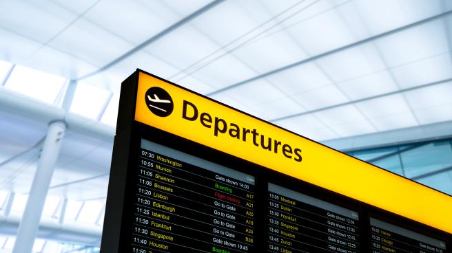 The departures board at an airport