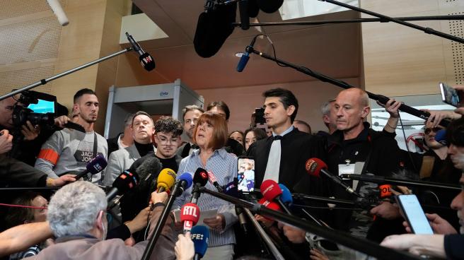 Gisele Pelicot speaks to the press after leaving court