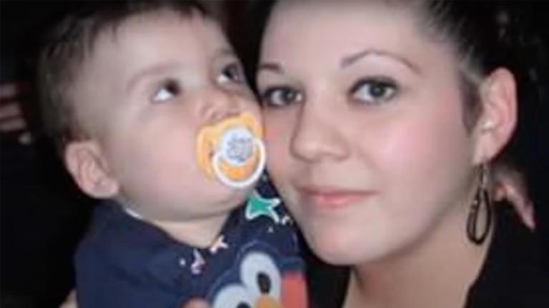 Melissa Cook holding her one-year-old son, Noah.