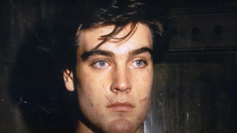 Robert Chambers with prominent scratches on his face