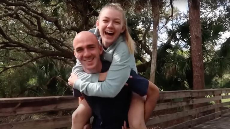 Gabby Petito laughs while Brian Laundrie gives her a piggyback
