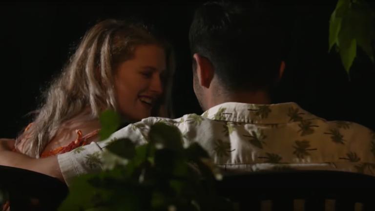 A man and woman get intimate
