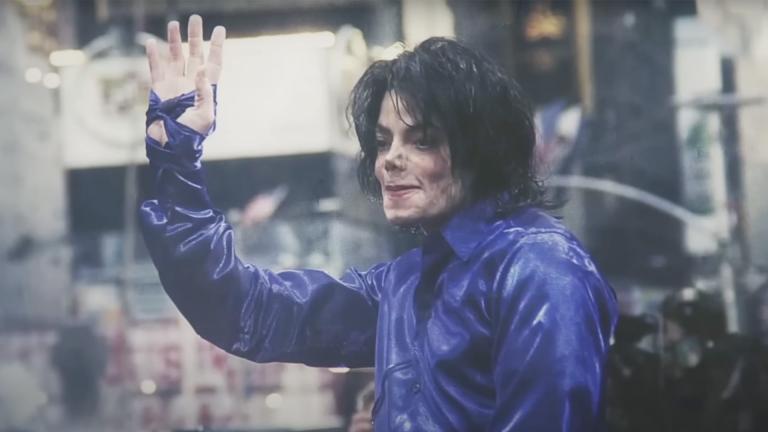 Michael Jackson waves to a crowd