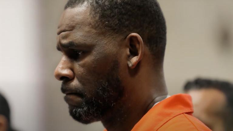 R. Kelly in court in an orange jumpsuit