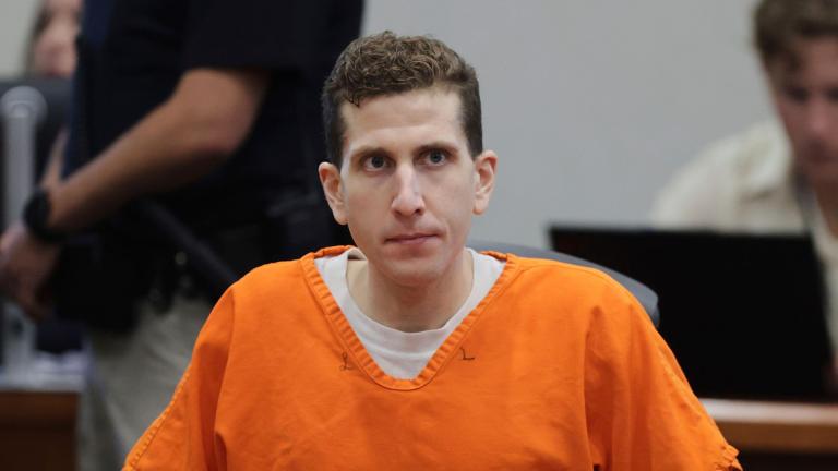 Bryan Kohberger sits in an orange prison jumpsuit during his sentencing hearing