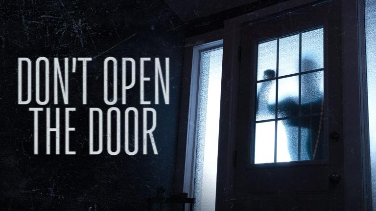 'DON'T OPEN THE DOOR' - A shadowy figure banging on a window