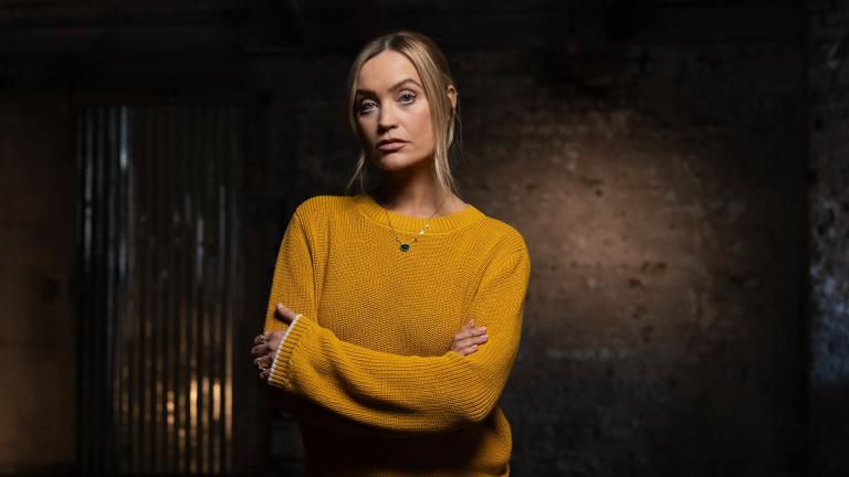 Laura Whitmore wearing a yellow jumper