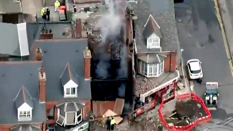 Aerial image of a house destroyed by an explosion