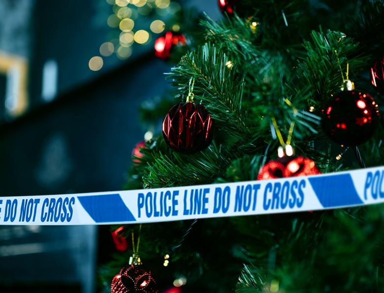 A Christmas tree with police tape 