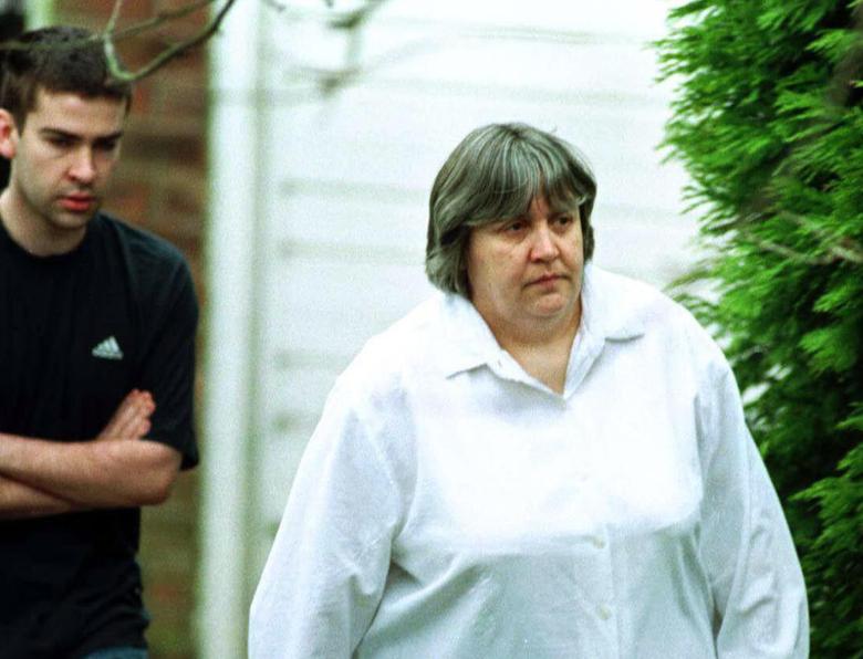 Primrose Shipman outside her house with her son David