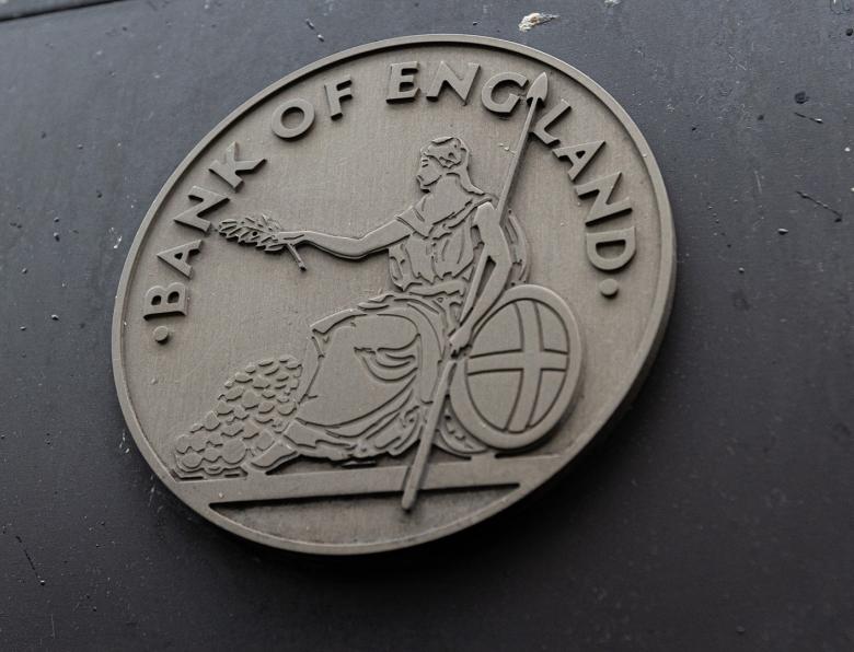 Bank of England crest on the side of a building