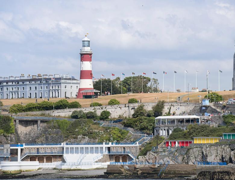 Plymouth Hoe with lighthouse, war memorial, Georgian architecture, bathing huts and Art Deco lido.