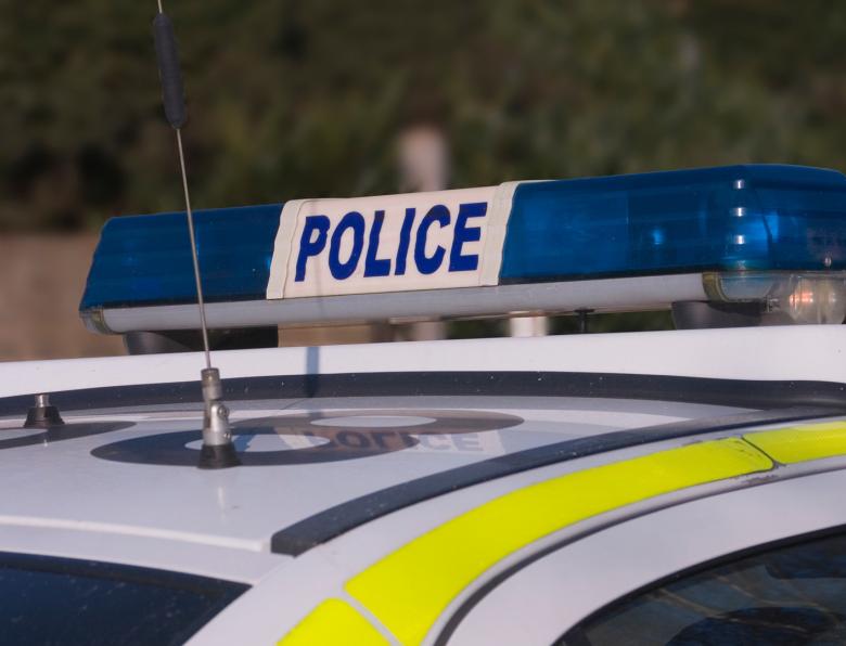 Blue lights on top of a police car
