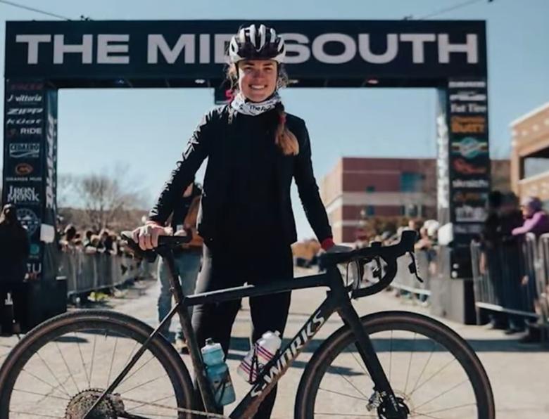 Moriah Wilson standing with her bike