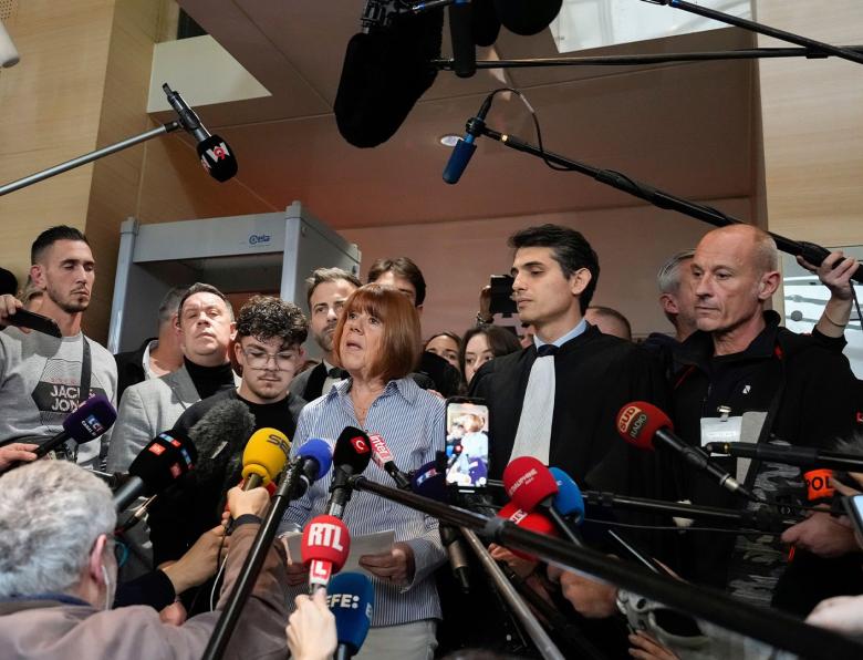 Gisele Pelicot speaks to the press after leaving court