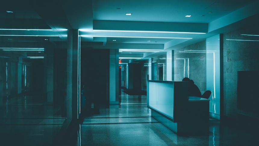 A low-lit hospital reception at night