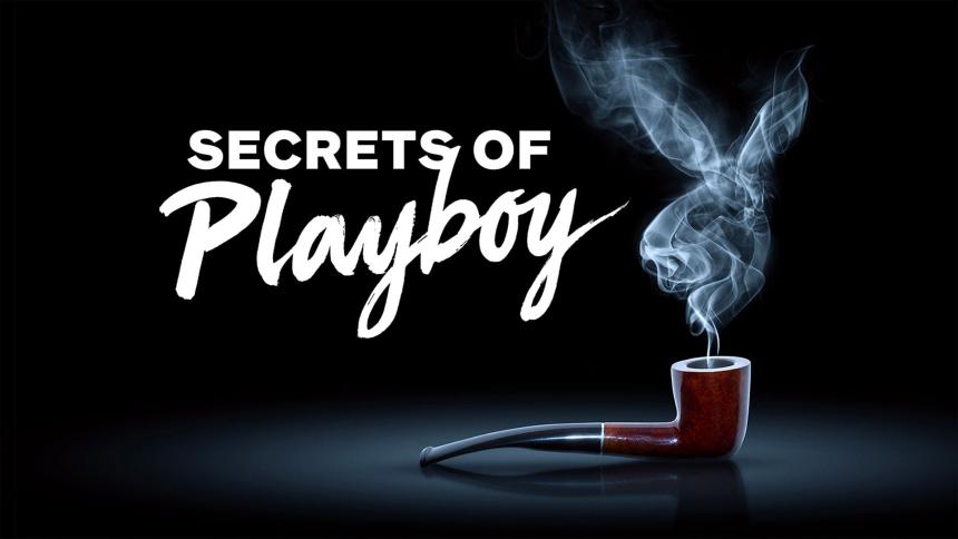 A smoking pipe releases smoke in the shape of the playboy bunny