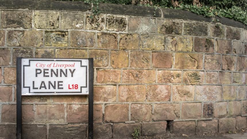 A photograph of the street sign 'Penny Lane' in Liverpool