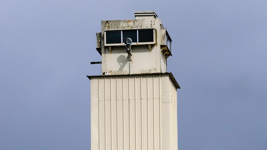 A photograph of the watchtower at the abandoned HM Prison Maze in Northern Ireland