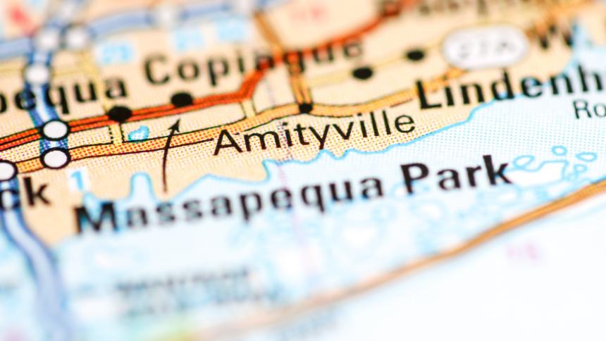 A photograph showing Amityville on a map