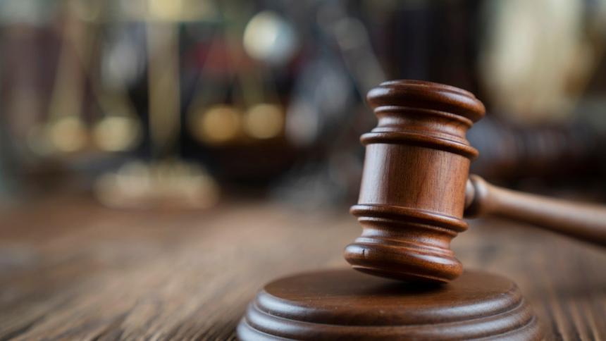 A photograph of a courtroom gavel