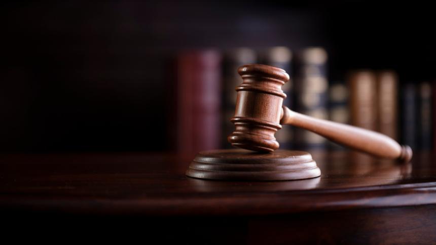 A photograph of a courtroom gavel