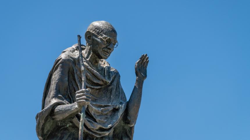 A photograph of a statue of Mahatma Gandhi 