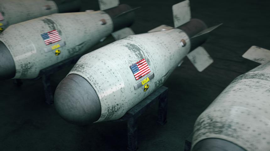 A 3D rendering of nuclear warheads featuring the Flag of the United States on the side.