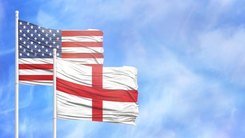 A photograph graphic of the Flag of America and the Flag of England (Cross of St. George) flying in the sky