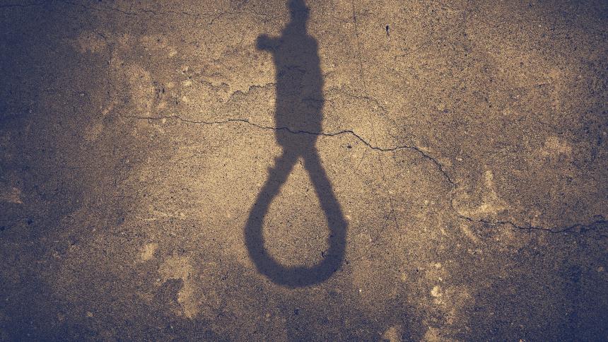 A silhouette of a noose