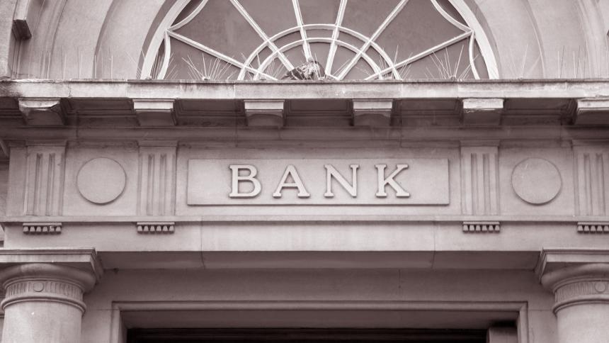 A stock photo of an old bank sign