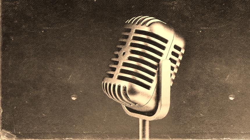 A photograph of a retro broadcast microphone