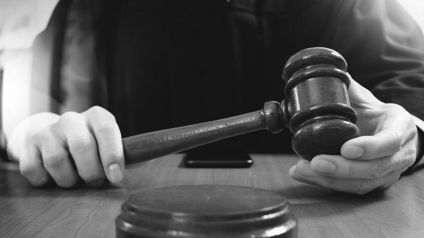 A stock photo of a judge holding a gavel