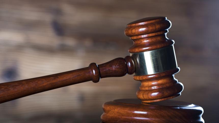 A photograph of a courtroom gavel