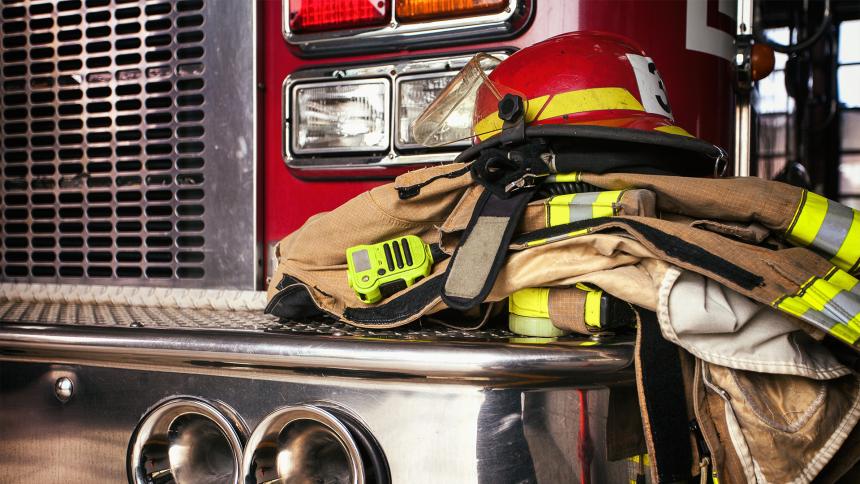 A photograph of American firemen gear on firetruck