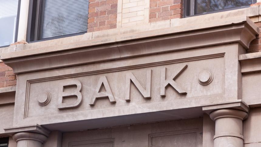 A stock image of an historic stonework bank sign