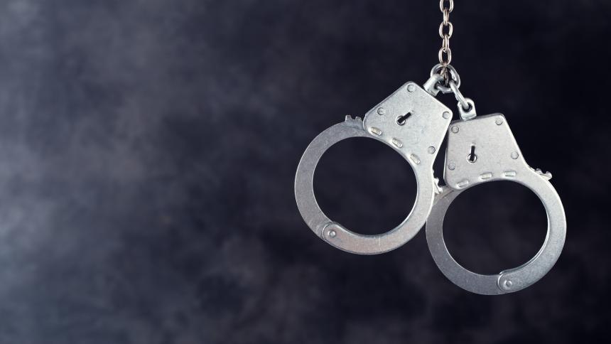 A stock photo of police handcuffs