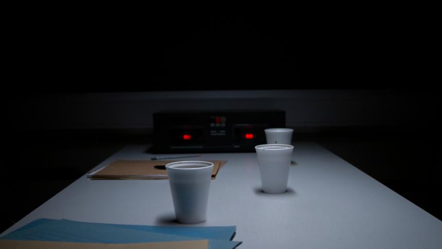 A stock image showing an empty police interview room