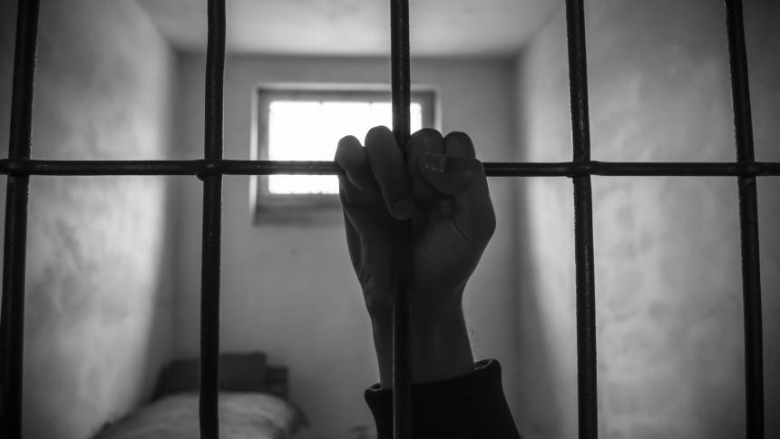 A stock image of prison bars