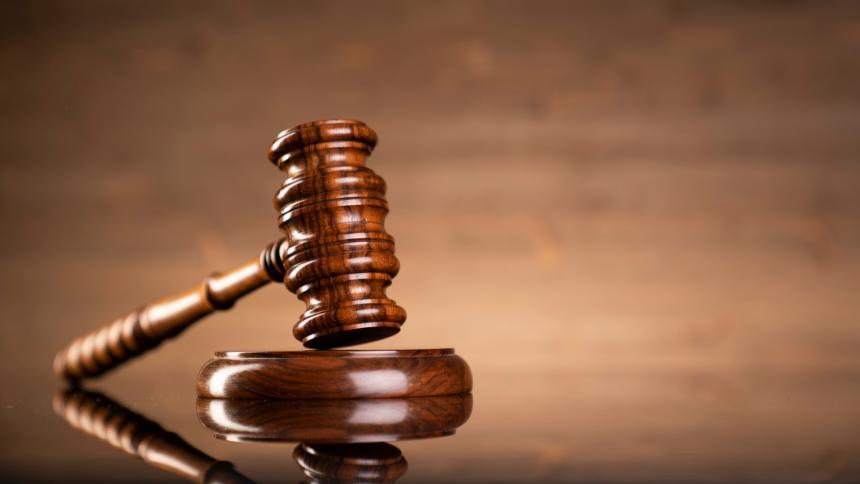 A photograph of a courtroom gavel