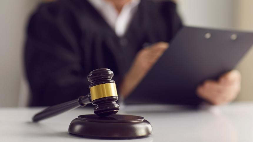 A stock photo of a judge and a courtroom gavel