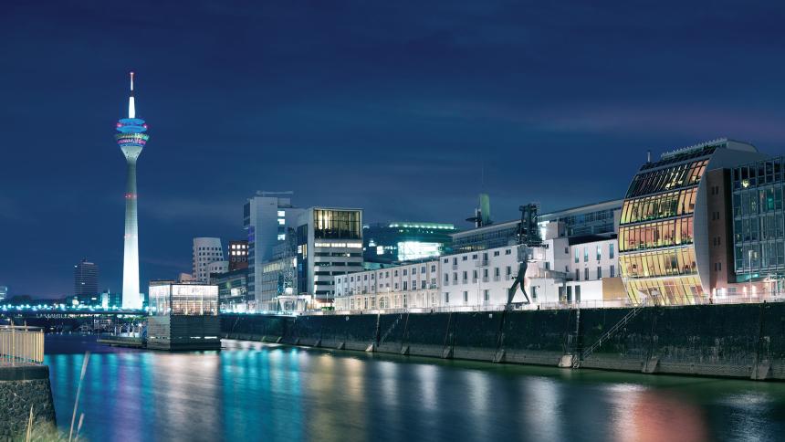 A stock photo of the Rhein river at night, in Dusseldorf, Germany