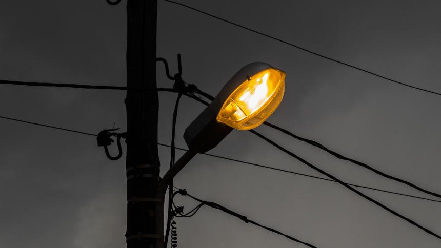 A stock image of a street lamp at night