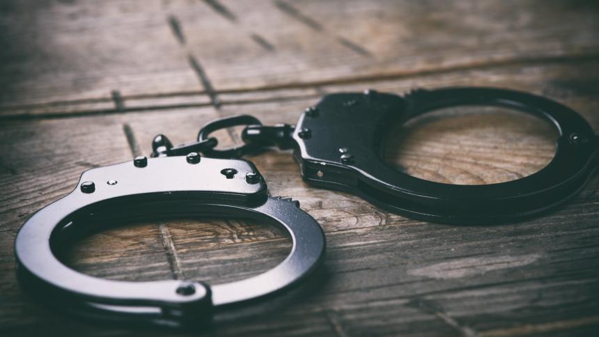 A stock photo of police handcuffs